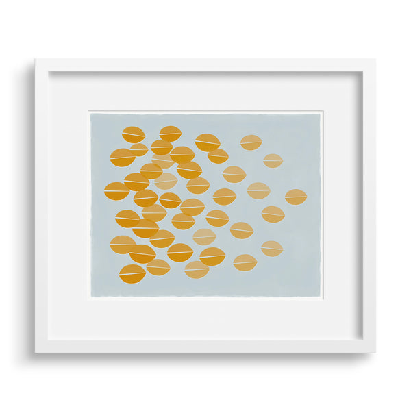 White framed version of a graphic print of ochre leaves rustling in the breeze by Janet Taylor | Household Art.
