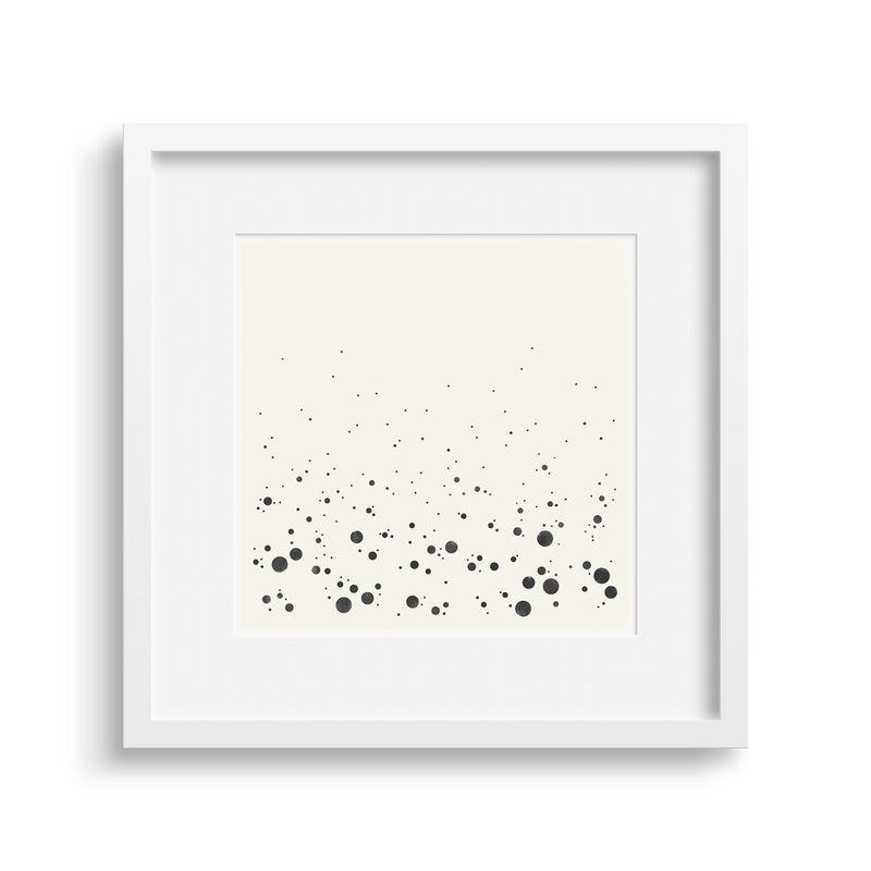 White framed version of ‘Spray Graphic’, a graphic abstract of the sea as it crashes into the shore. Limited Edition Print by Janet Taylor | Household Art.